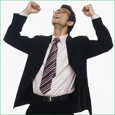 Close-up of a businessman cheering